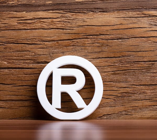 Trademark Sign on wooden background